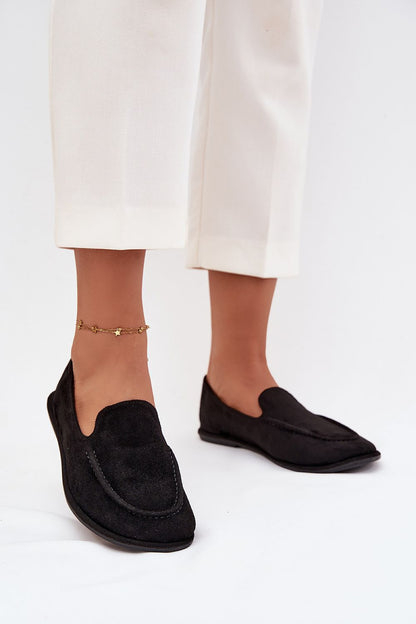 Premium eco suede moccasins for women by Step in style, depicted in a chic setting, highlighting their versatile and elegant styling options.