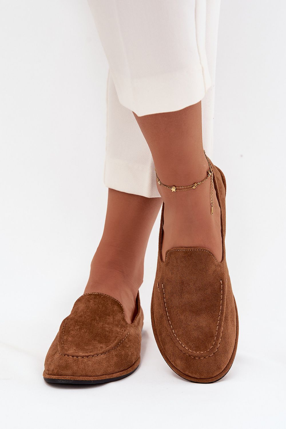 Fashion-forward women's eco suede moccasins by Step in style, featuring a classic rounded toe silhouette and available in multiple sizes.