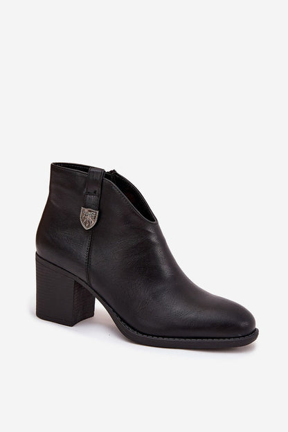 Step in Style eco leather ankle boots showcasing a chic decorative strap, ideal for stylish winter outfits.