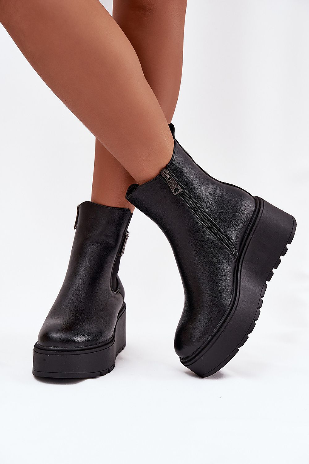 Vinceza Women's eco leather ankle boots with wedge heel, featuring zipper fastening and unique side detailing, perfect for both casual and formal outfits.