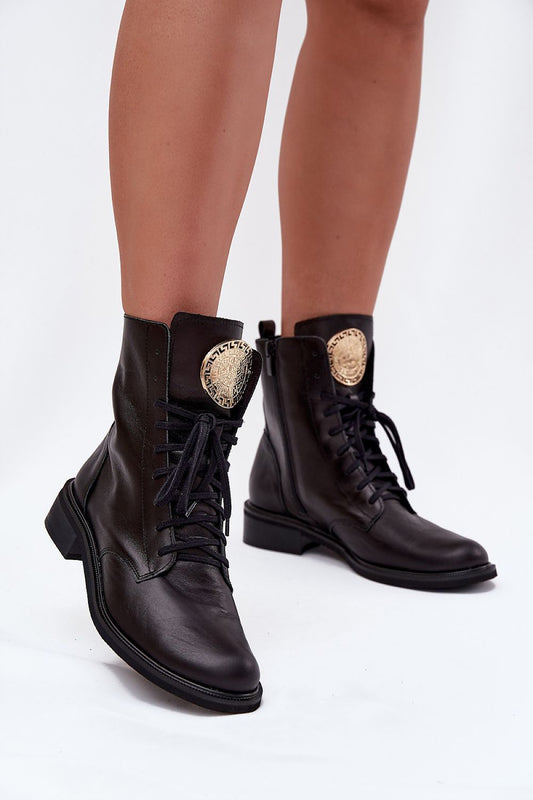 Elegant women's ankle boots crafted from natural leather featuring exquisite gold detailing, designed by Step in Style. These ankle boots merge classic charm with contemporary flair.