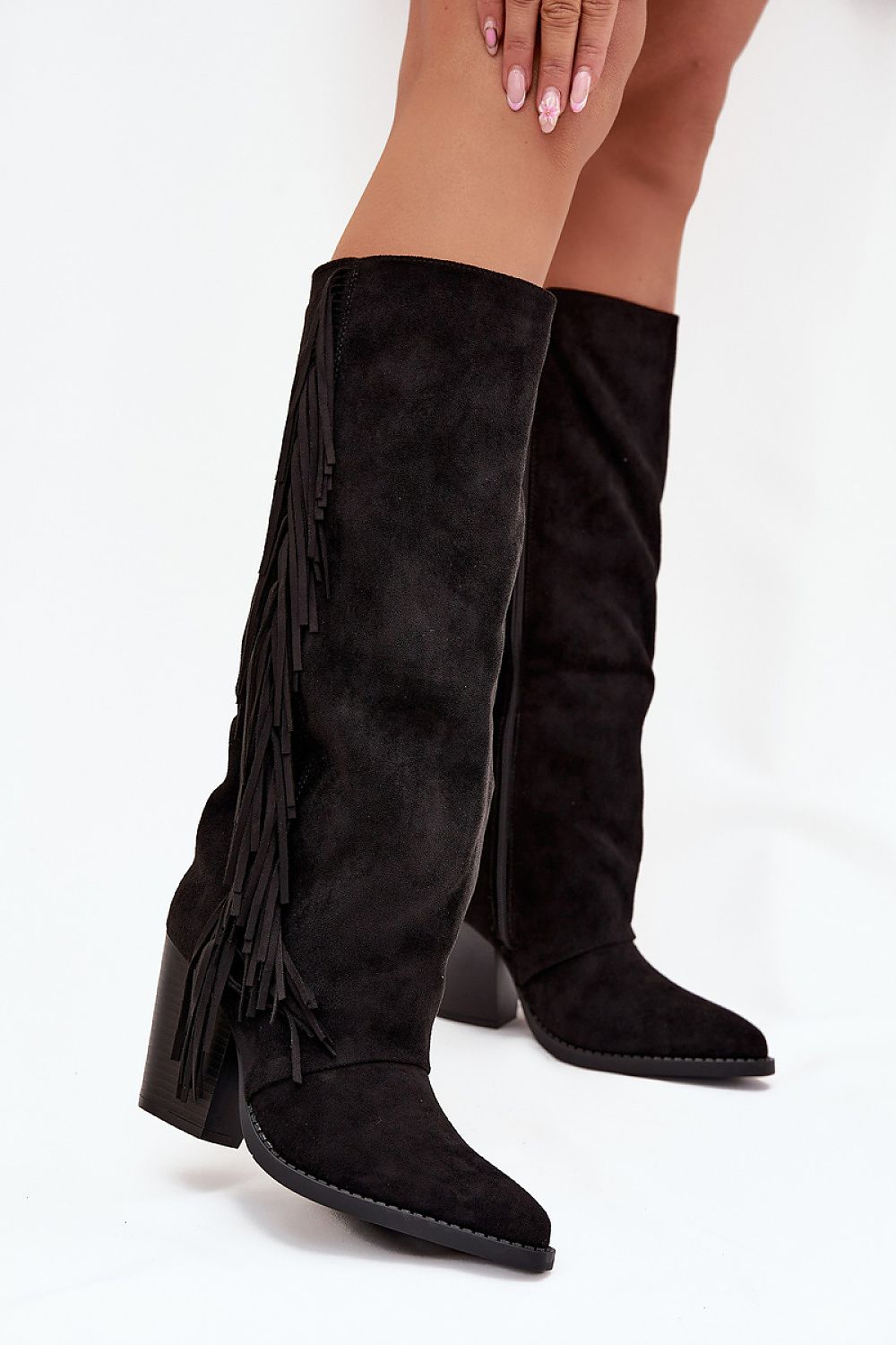 Luxury faux suede cowboy heel boots for women with fringes, crafted by Step in Style, showcasing a chic boho look perfect for modern casual outfits.