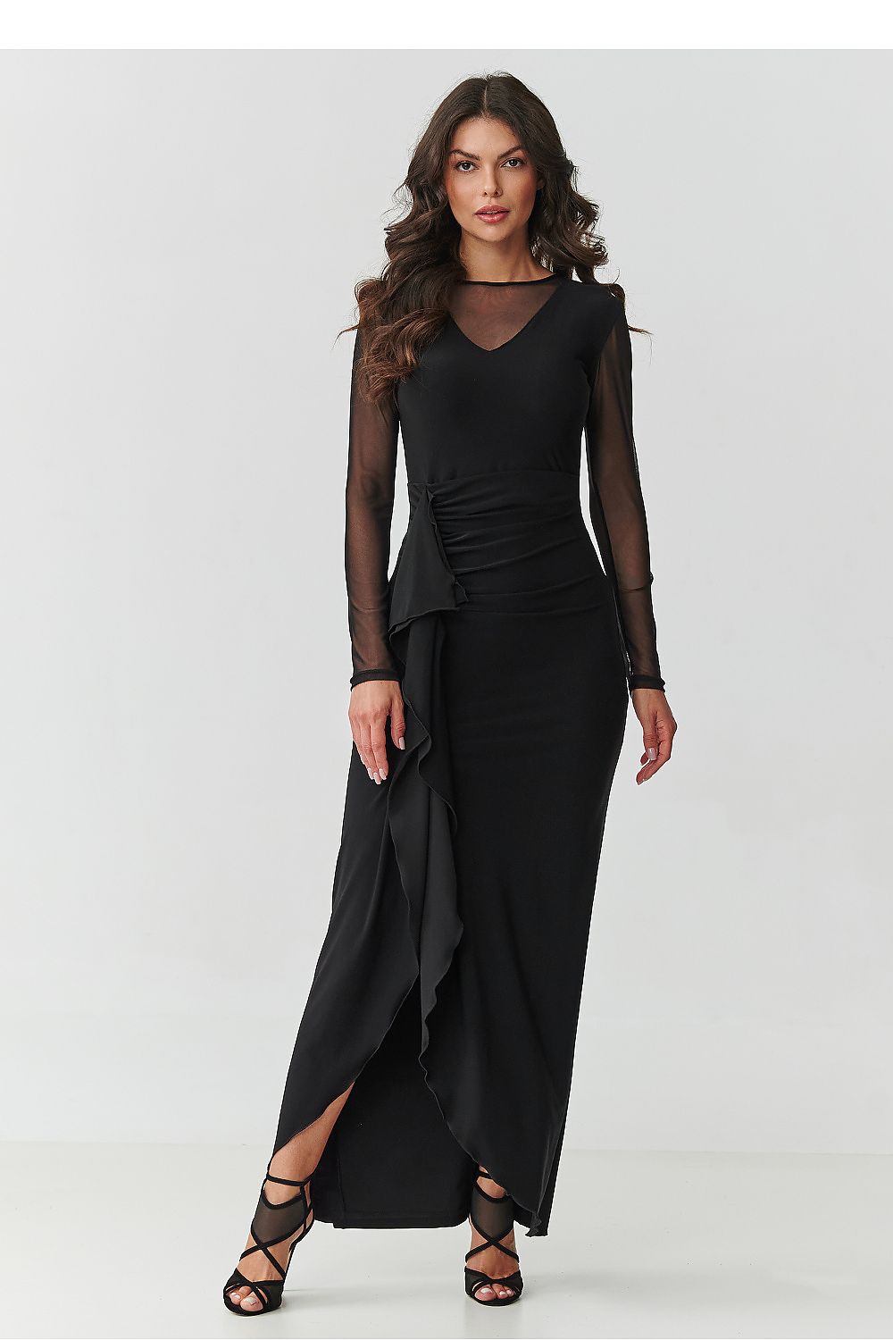 Elegant black maxi dress with tulle sleeves and ruffle by Makadamia, showcasing a captivating V-shaped neckline and stunning silhouette.