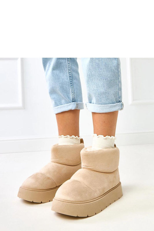 Luxurious women's ankle snow boots by Solea featuring soft fur lining and elegant design, perfect for winter style.