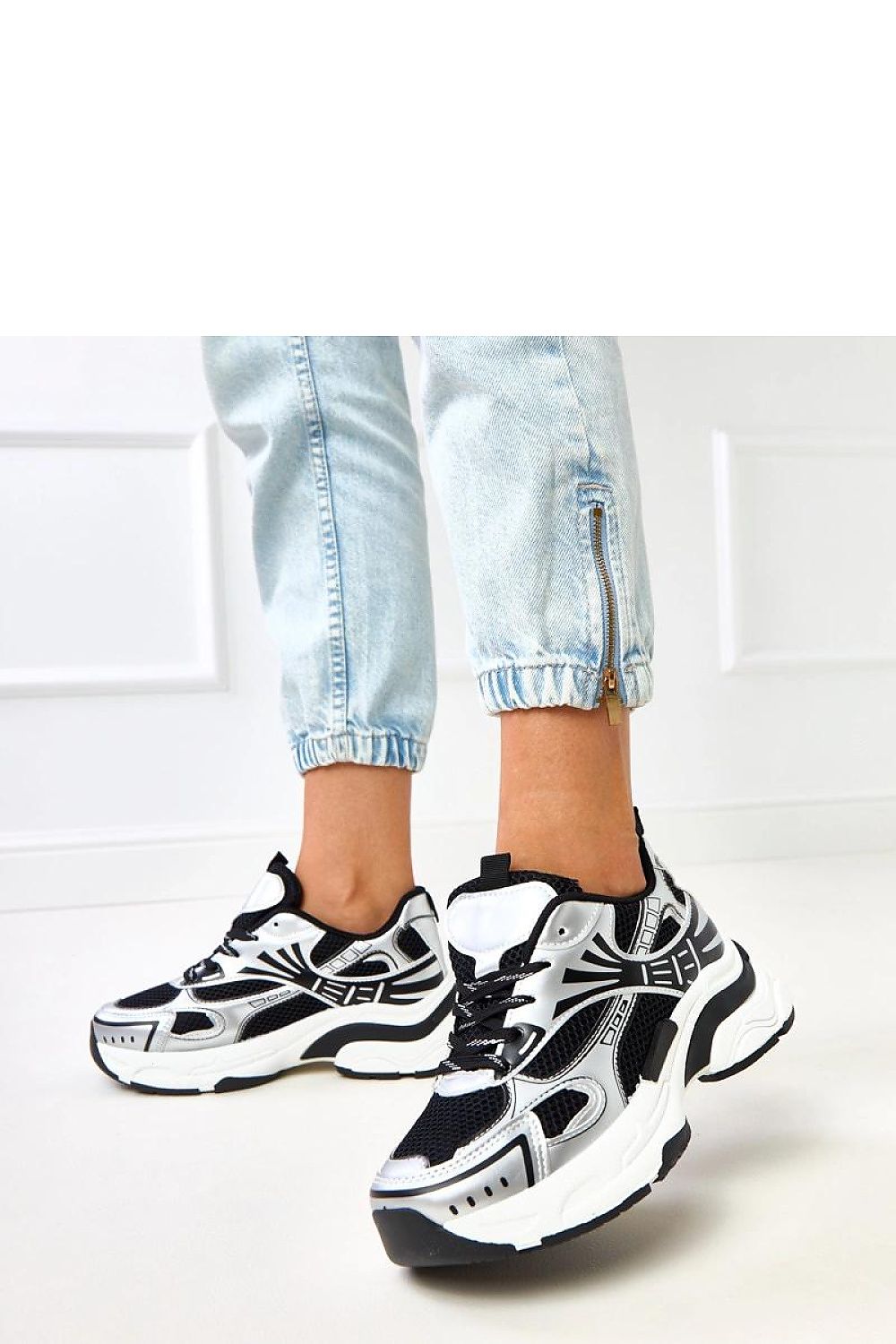 Close-up of Solea stylish sport shoes for women, highlighting the luxurious synthetic leather and fabric footbed for enhanced comfort.