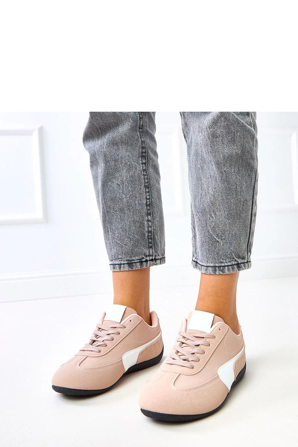 Stylish Solea sport shoes featuring a round toe and laced design, made from durable ecological suede for lasting comfort.