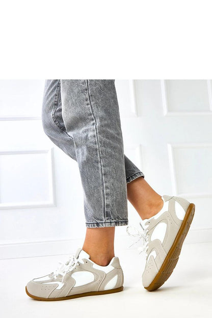 Solea laced eco-friendly suede sport shoes displaying classic comfort and stylish design in a luxurious setting.