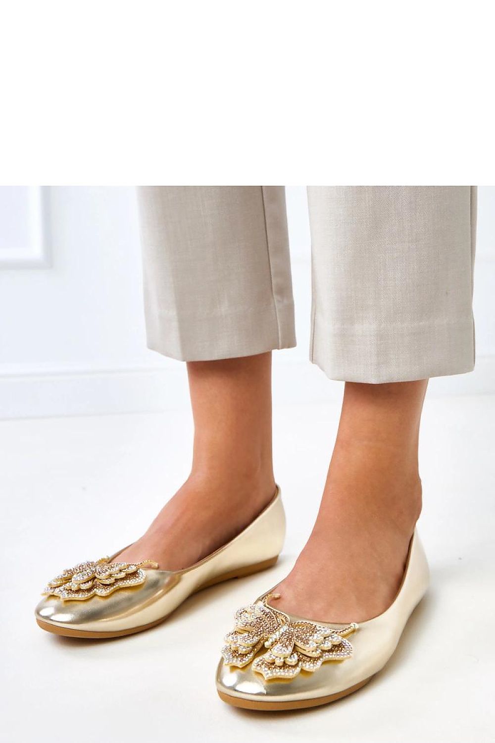Close-up of Solea Women's Ballet Flats highlighting the exquisite butterfly embellishment adorned with zircons for a touch of elegance.