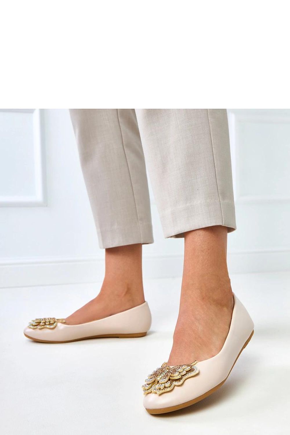 Solea women's ballet flats showcasing a delicate butterfly accent with shimmering zircons, designed for comfort and sophistication, available in EU sizes 36-41.
