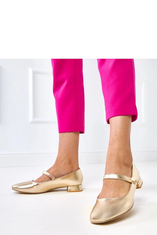 Elegant eco-leather pumps with pearl strap by Solea, featuring a comfortable low heel, ideal for chic styling.