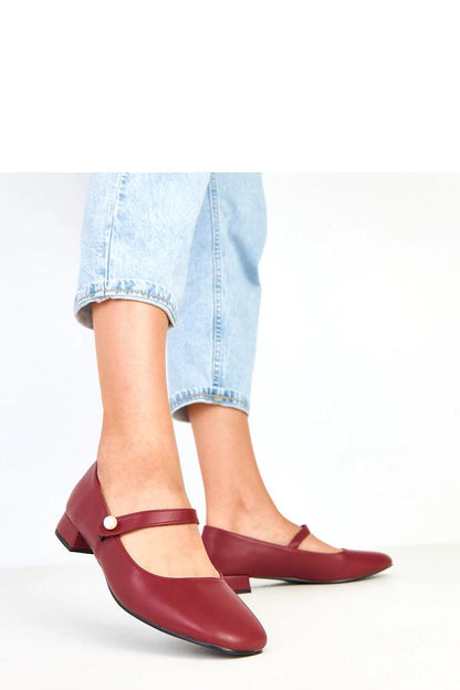 Versatile low heel pumps by Solea with eco-leather construction and pearl strap detail, enhancing your footwear collection.