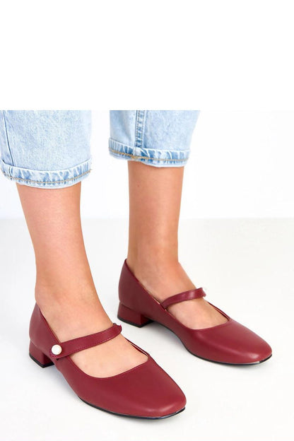 Elegant eco-leather pumps by Solea featuring a delicate pearl strap, stylish low heel, and comfortable round toe. Available in sizes EU 36-41, perfect for adding a touch of luxury to any outfit.