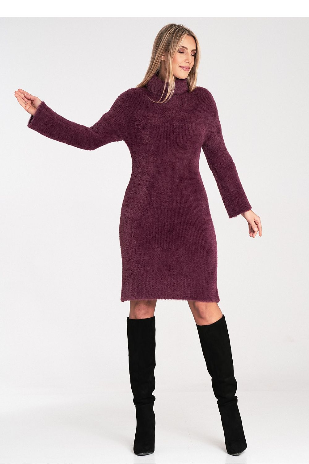 Model wearing the Figl Daydress with turtleneck, portraying its stylish elegance and versatility for any occasion, made from soft fluffy fabric.