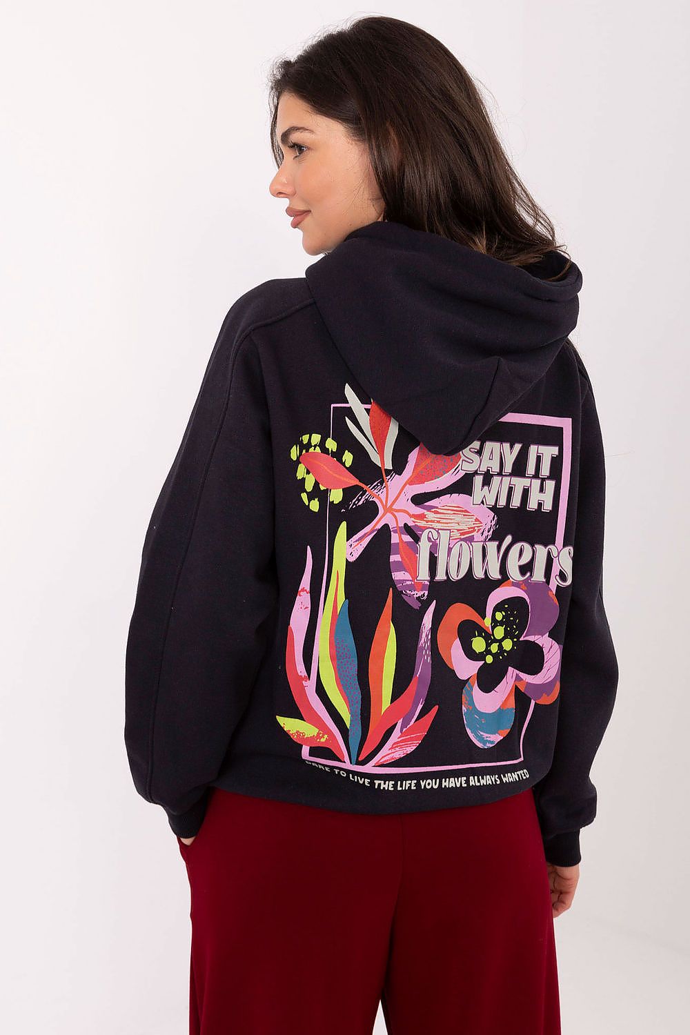 Back view of Sublevel women's sweatshirt illustrating the large, artistic print, reflecting modern fashion trends for effortless elegance.