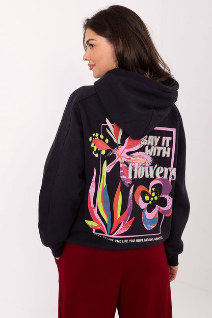 Back view of Sublevel women's sweatshirt illustrating the large, artistic print, reflecting modern fashion trends for effortless elegance.