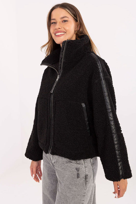 Elegant women's faux fur jacket from Sublevel showcasing stylish eco-leather details, perfect for transitional seasons, offered in a variety of sizes from XS to XXL.