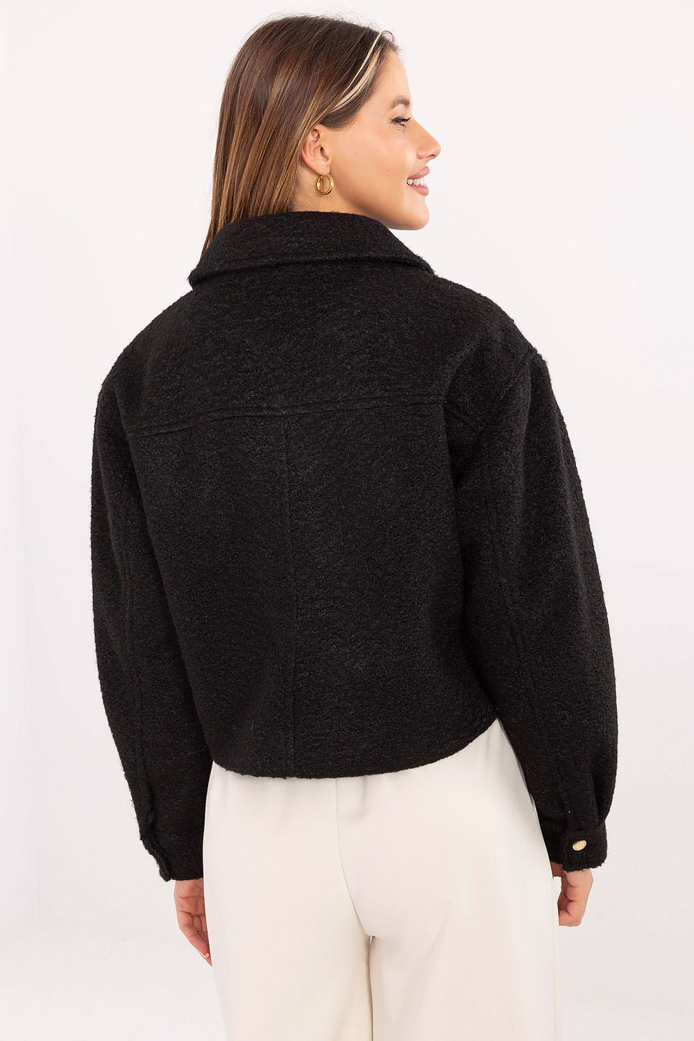 Close-up of Sublevel's women's luxurious artificial fur jacket, highlighting the rich fabric and modern casual collar.