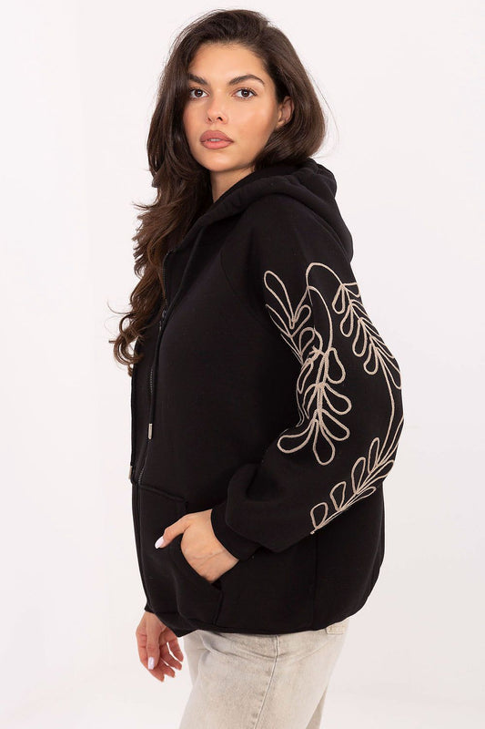 Fashionable women's hoodie with front pockets and luxurious embroidery, designed by Relevance, ideal for chic everyday wear.