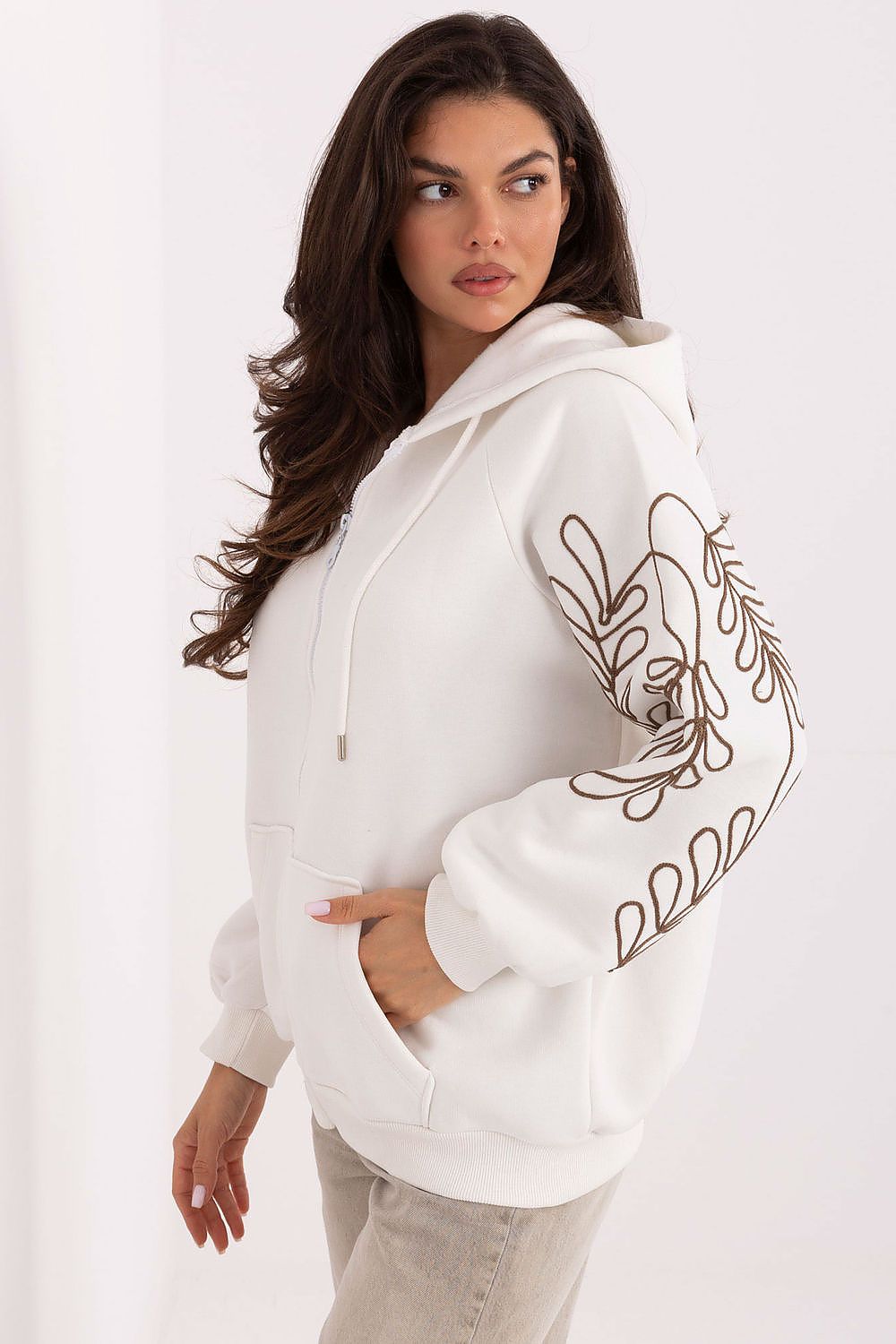 Sophisticated casual women's hoodie by Relevance, made from soft cotton blend, featuring stylish embroidery and practical functionality for everyday elegance.