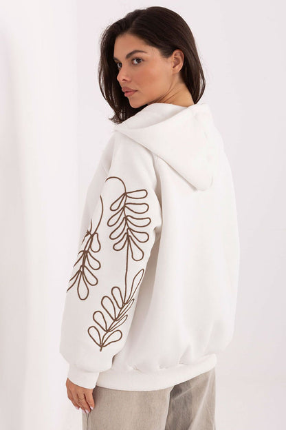 Elegant casual women's hoodie by Relevance featuring a stylish zipper, embroidered details, and practical front pockets for a sophisticated look.
