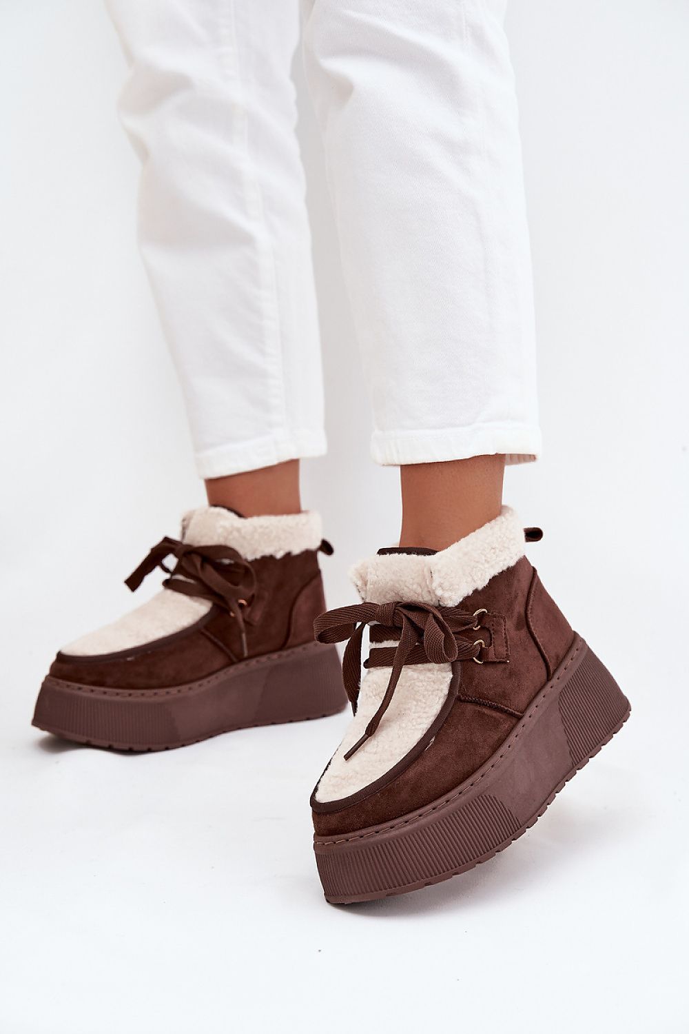 Fashion-forward winter footwear for women, featuring eco suede and fur lining, designed for the modern woman by Step in Style.