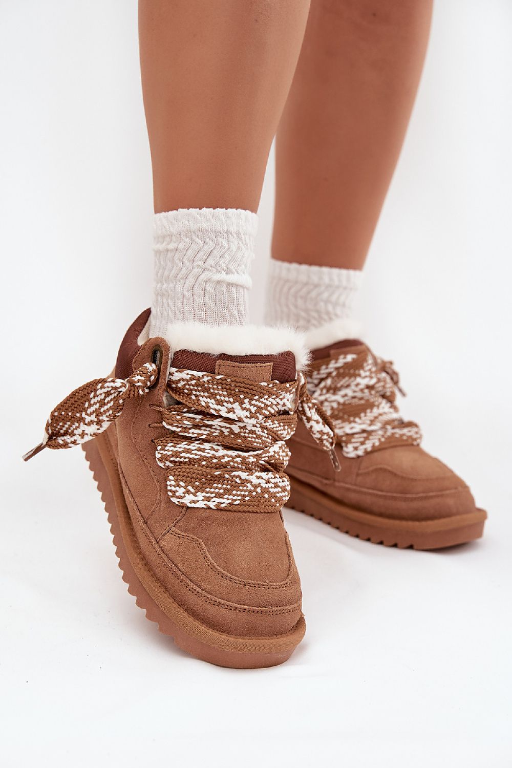 Luxury Vinceza low women's snow boots made from natural suede with a plush fur lining, perfect for winter elegance.