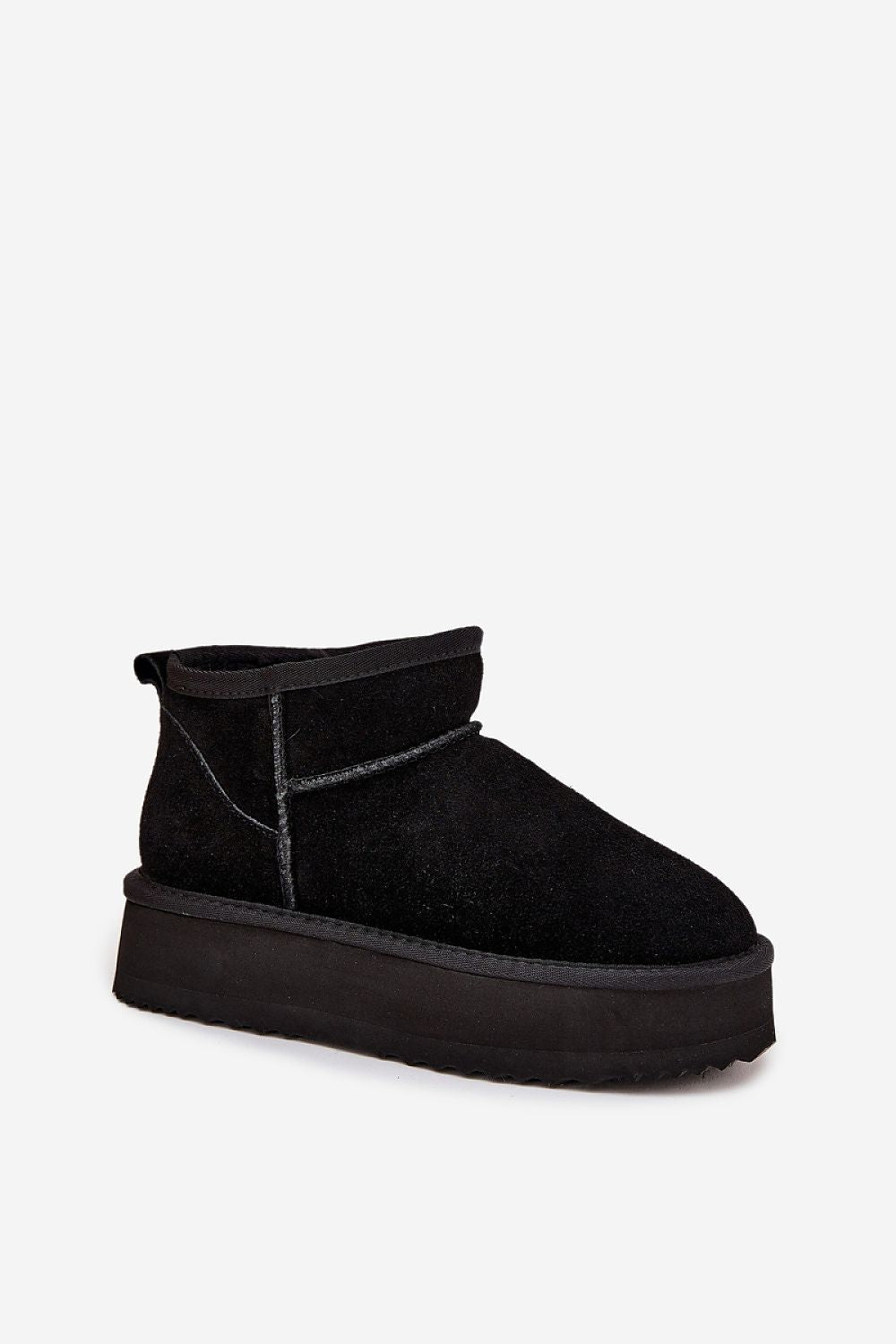 Close-up of Vinceza slip-on suede snow boots, highlighting premium materials and luxurious comfort suitable for colder days - Step in Style.