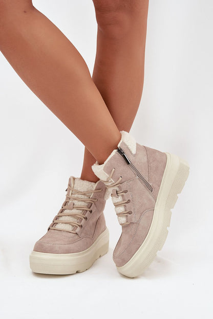 Chic and fashionable women's snow boots by Step in Style in luxurious suede, showcasing a comfortable fur lining and a robust platform.