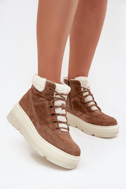 Luxury women's snow boots in suede with fur lining, designed by Step in style, showcasing an elegant platform for winter comfort.