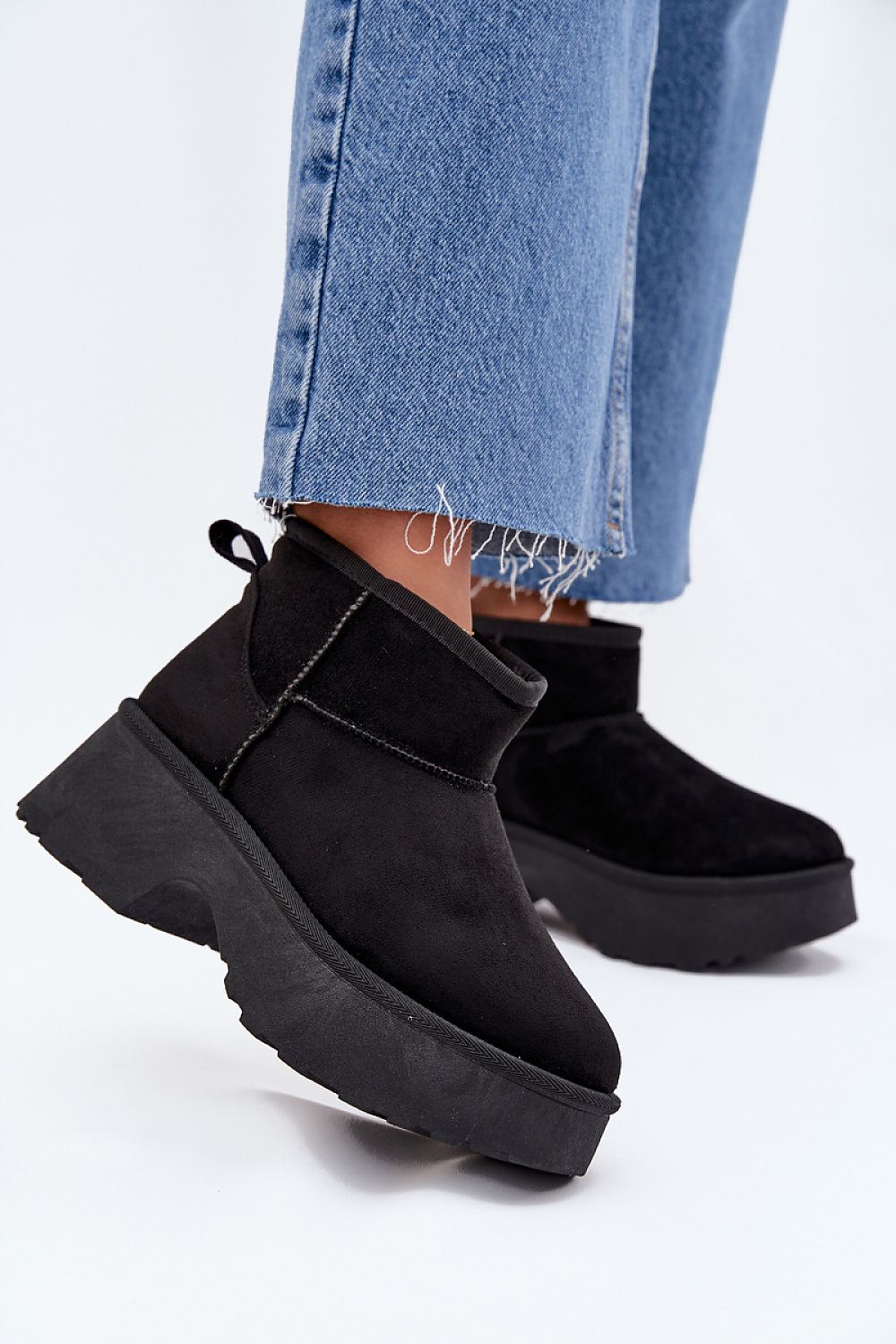 Luxury faux suede women's snow boots with fur lining, featuring a stylish platform and heel, designed by Step in Style.