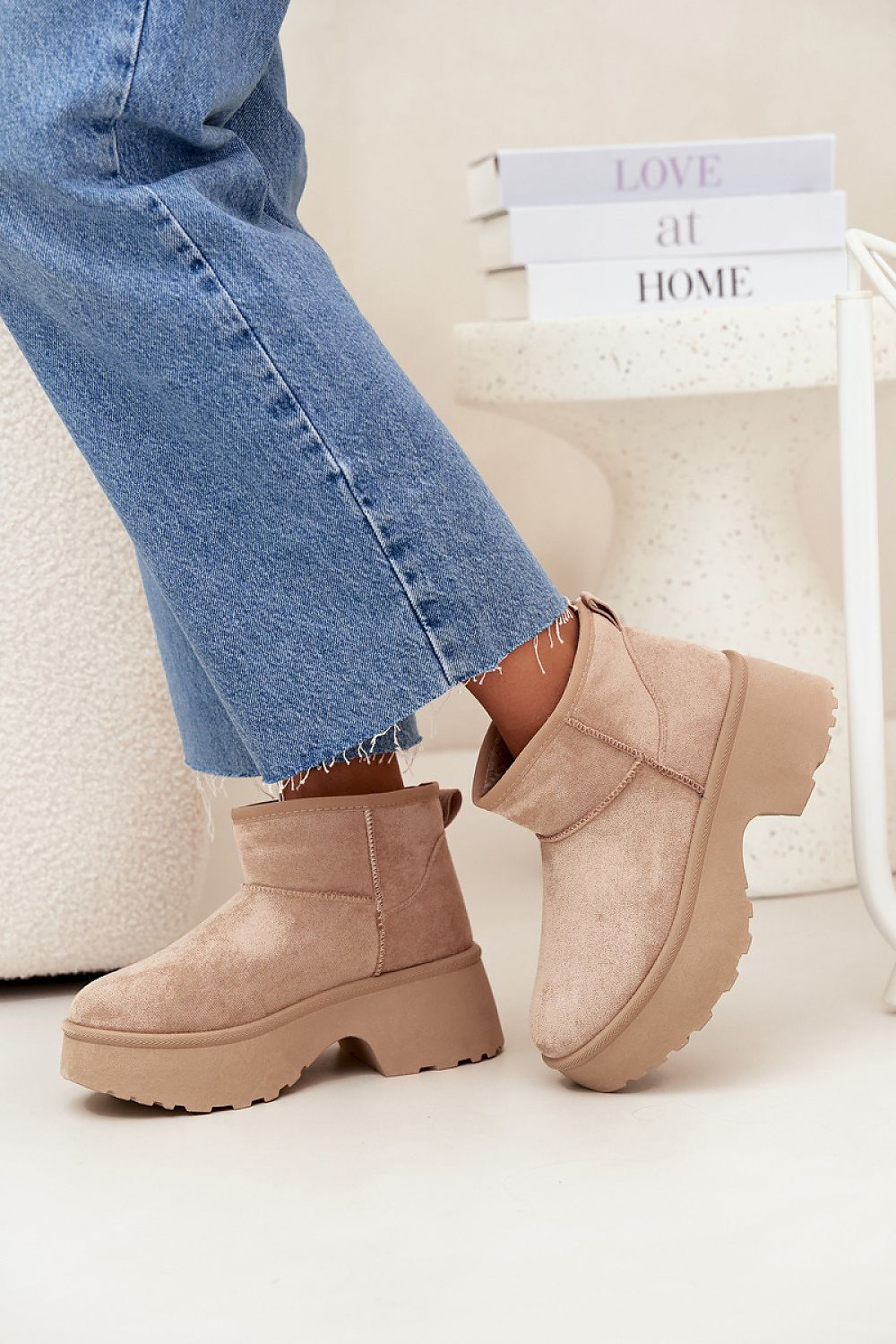 Step in Style luxury winter boots for women, showcasing a supportive heel and platform design, made from high-quality faux suede with a warm fur lining.