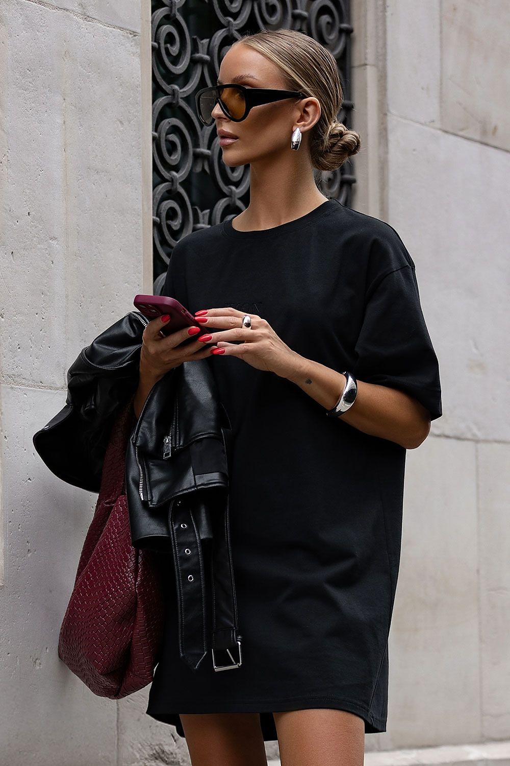 Stylish pairing of IVON oversized cotton dress with a leather jacket, illustrating its versatility for chic, effortless outfits.