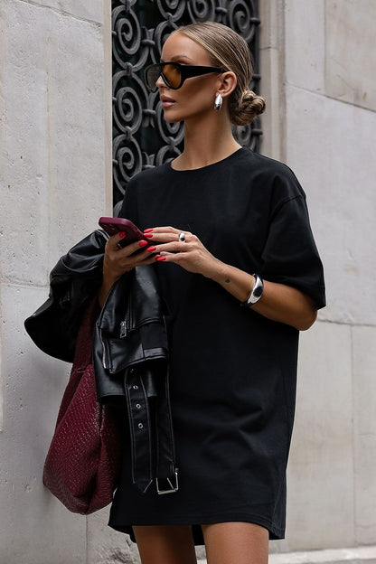 Stylish pairing of IVON oversized cotton dress with a leather jacket, illustrating its versatility for chic, effortless outfits.