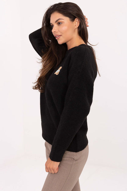 Chic and cozy women's sweater by Factory Price, showcasing a classic round neckline and long sleeves, perfect for versatile outfits, adorned with a charming teddy bear patch.