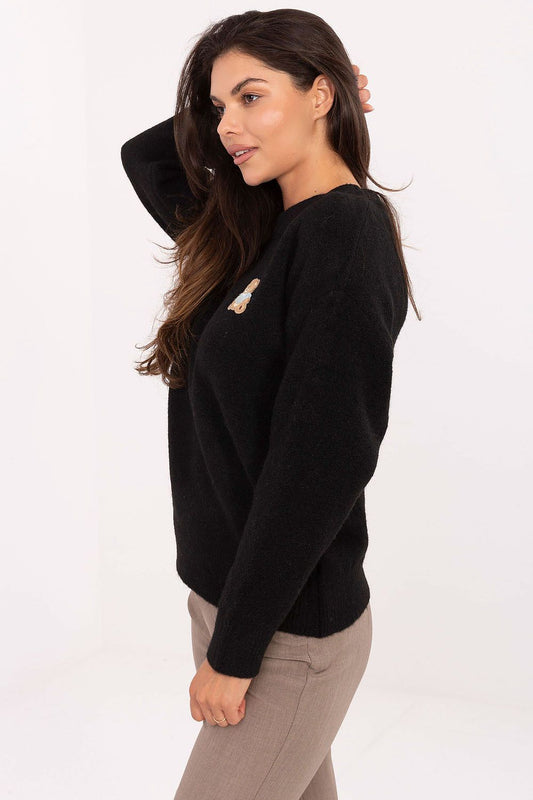 Chic and cozy women's sweater by Factory Price, showcasing a classic round neckline and long sleeves, perfect for versatile outfits, adorned with a charming teddy bear patch.