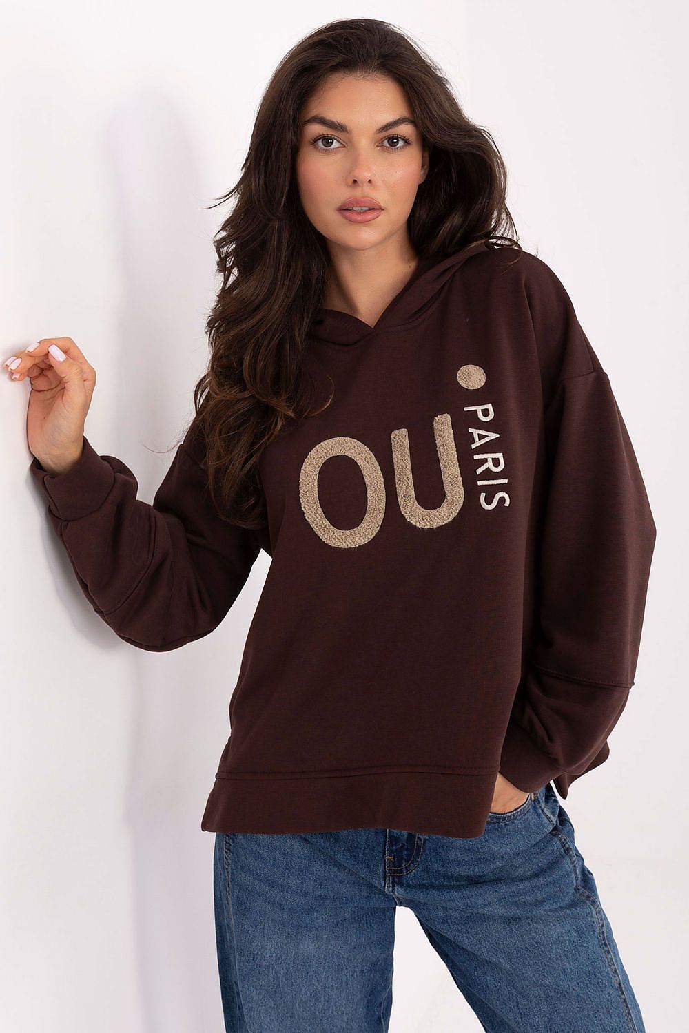 Close-up of the high-quality cotton fabric of the luxury women's sweatshirt, featuring unique embroidery details, by Factory Price.