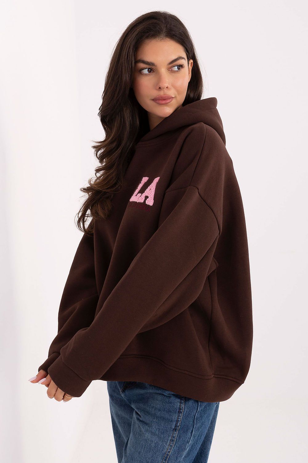 Chic casual look of the luxury hoodie sweatshirt for women by Factory Price, featuring a practical hood and standard length, ideal for any occasion.