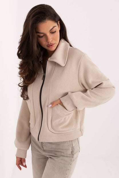 Chic lightweight women's polar jacket from Factory Price, featuring a stylish short design ideal for casual outings in transitional seasons.