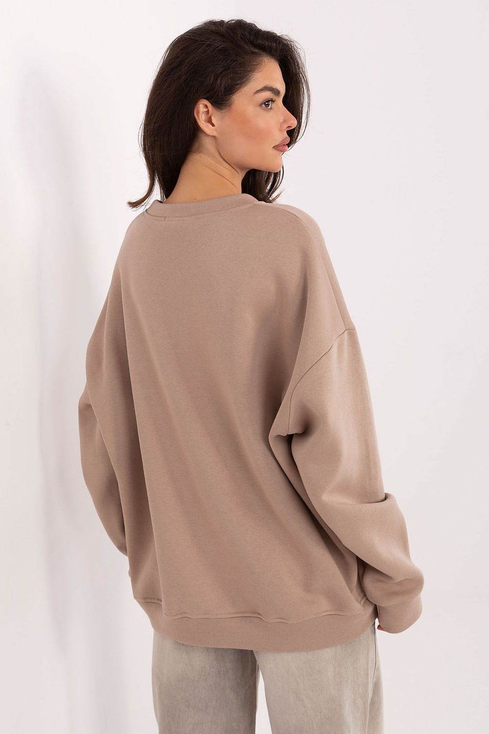 Factory Price women's casual blouse with long sleeves and round neckline, combining comfort and sophistication with its unique embroidered design.
