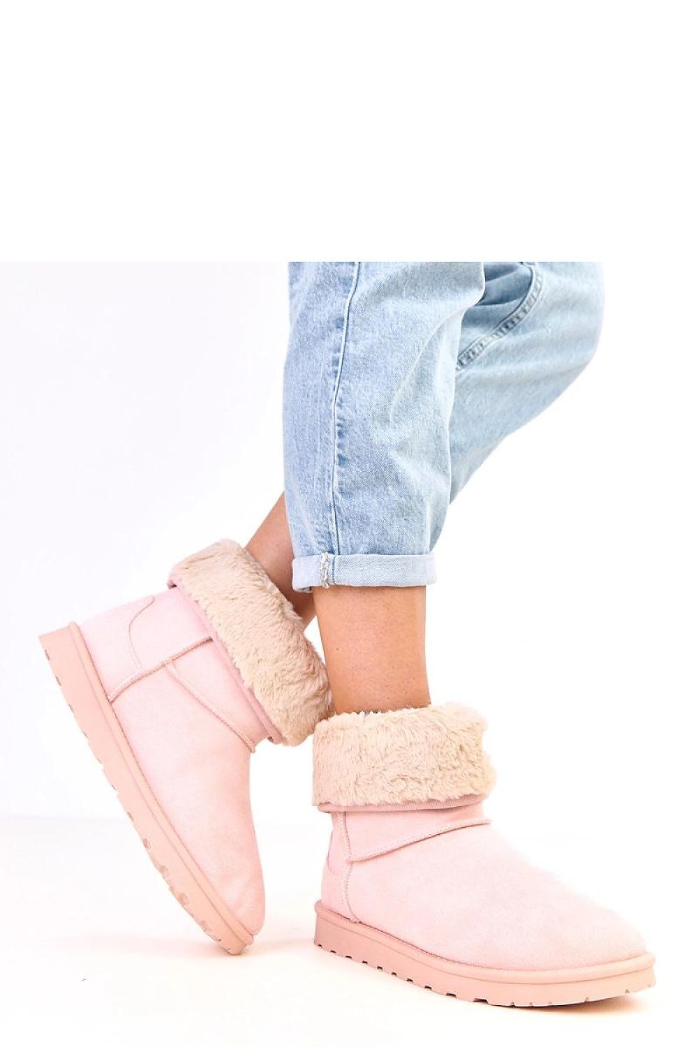 Fashionable Solea luxury women's snow boots in an elegant setting, perfect for winter wear combining practicality and style.