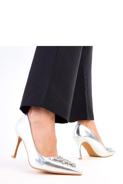 Close-up of Solea stilettos showcasing high-quality patent leather and sparkling zircons to elevate your style.