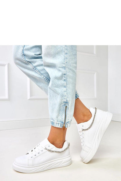 Solea Women's Sports Shoes displayed against a chic backdrop, highlighting their stylish design and 4.5 cm platform for luxurious everyday wear.