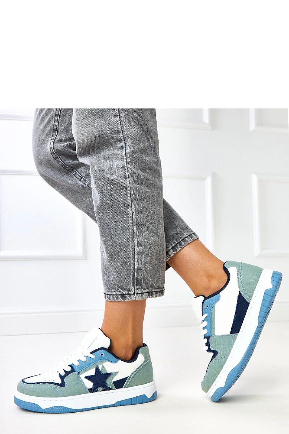 Close-up view of Solea Classic Low-Cut Sports Shoes, featuring durable synthetic leather, round toe, and intricate lacing for a secure fit and luxurious comfort.