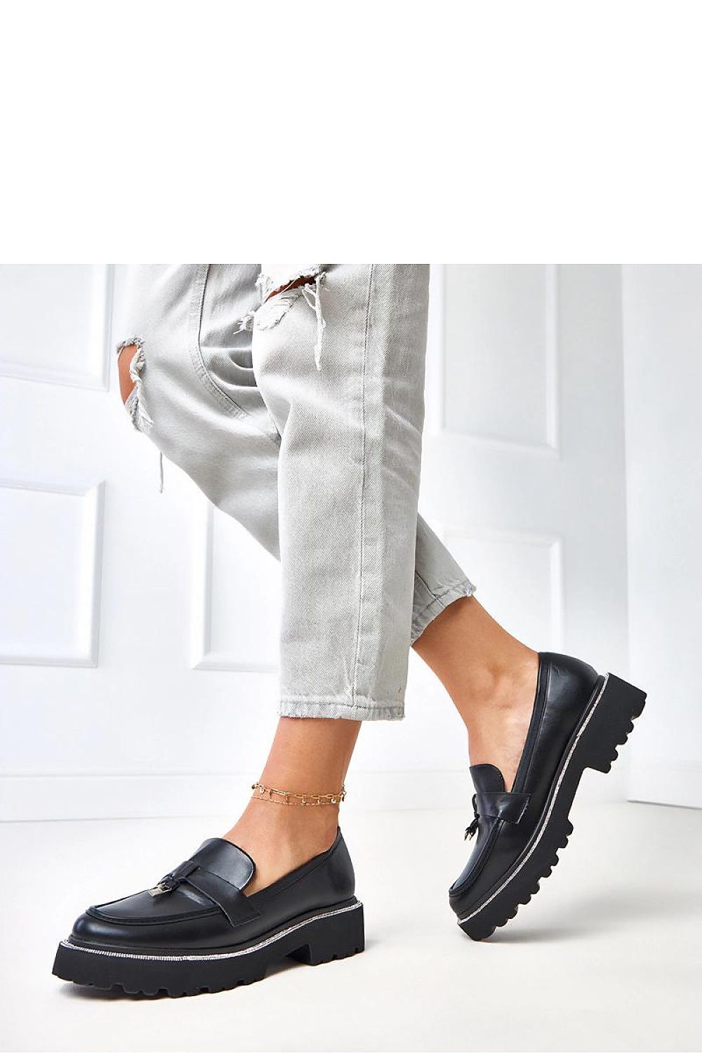 Close-up view of the luxurious eco-leather moccasins by Solea featuring a chic round toe and stylish zircon embellishments, designed for ultimate comfort.