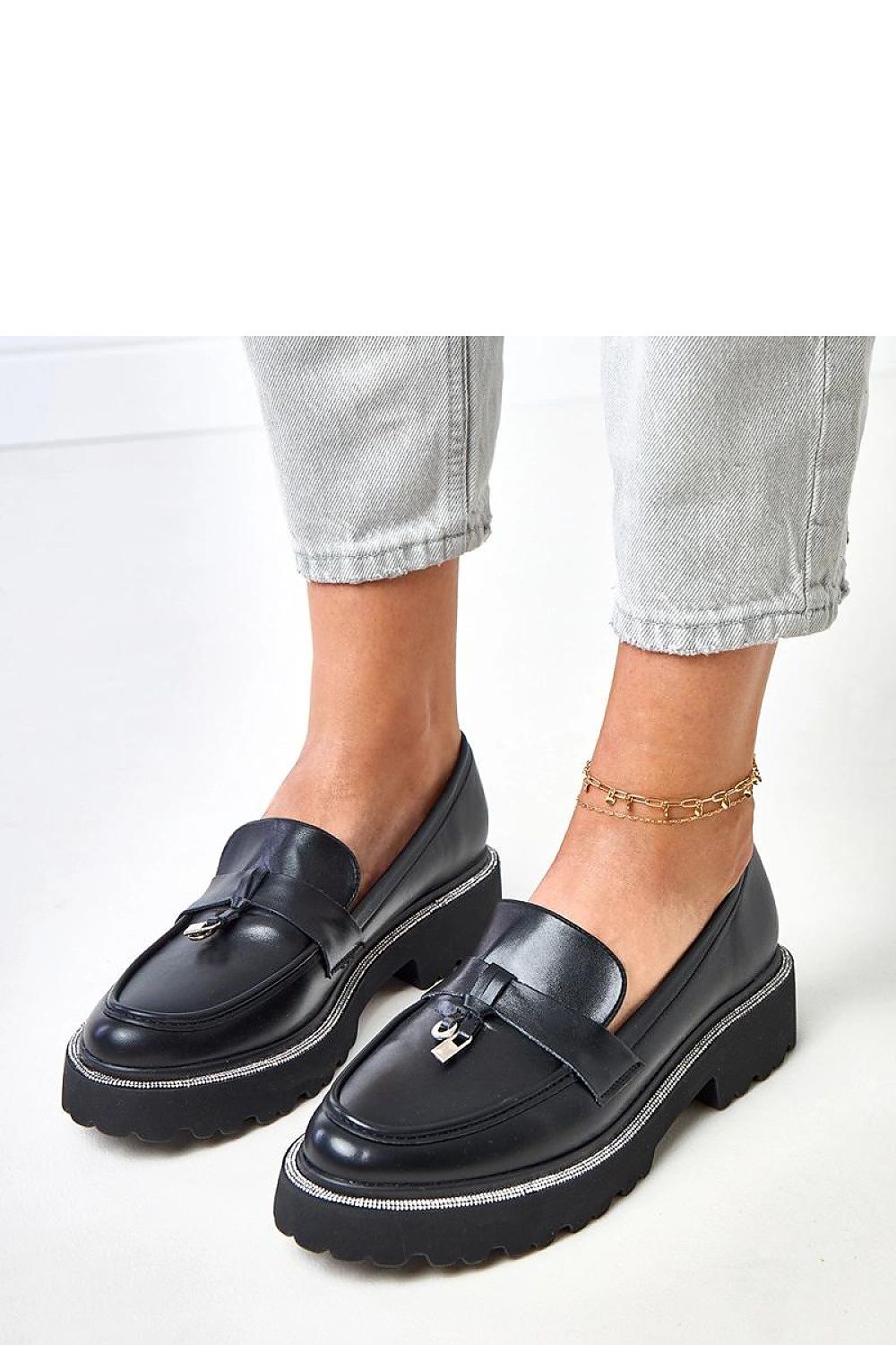 Solea's women's moccasins in eco-leather with a 3.5 cm heel, elegantly crafted with precise detailing and versatile design for chic everyday wear.