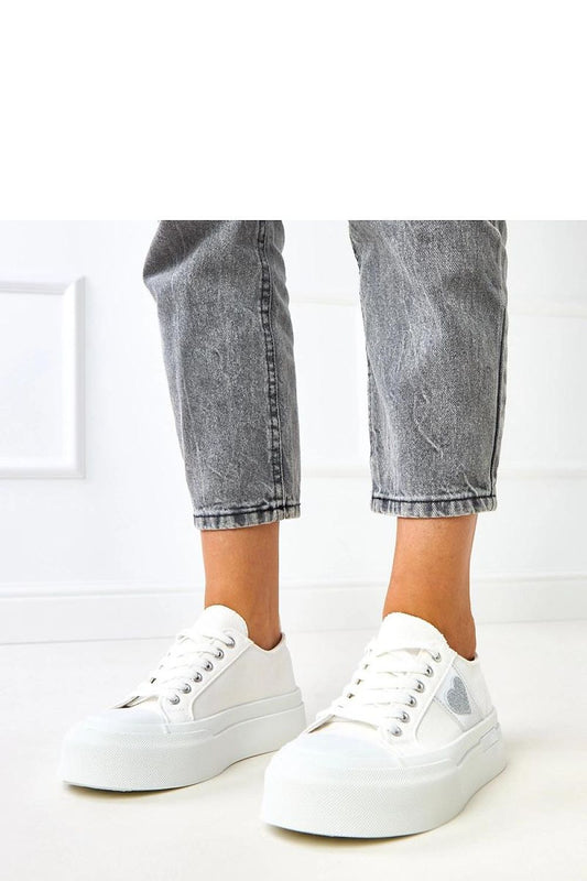 Solea Women's Lightweight Low-Cut Sport Shoes featuring a stylish heart print design, perfect for casual and sporty looks, showcasing a 4.5 cm platform for added height and comfort.