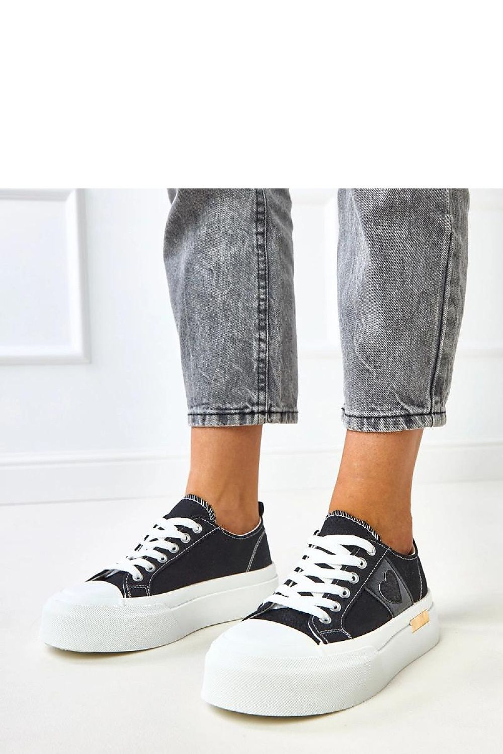 Solea Women's heart print sports shoes in various sizes, blending modern design with girlish charm for everyday wear.