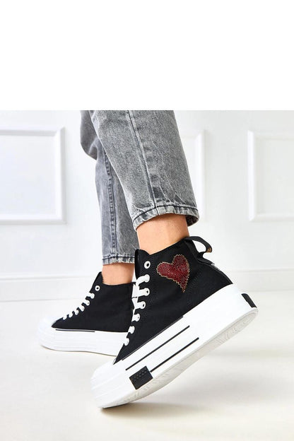 Close-up view of Solea Women's low-cut sneakers showcasing the elegant heart print detail and the comfortable fabric material, designed for everyday luxury in sizes EU 36-41.