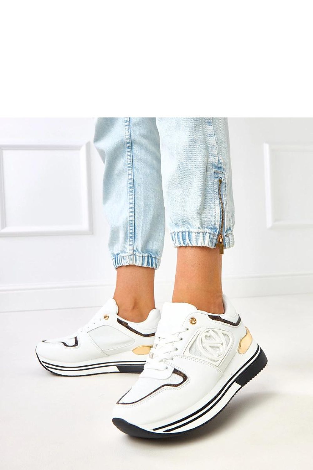 Close-up of Solea vegan leather sports shoes showcasing the unique embossed detailing and round toe, perfect for women seeking trendy yet comfortable footwear.