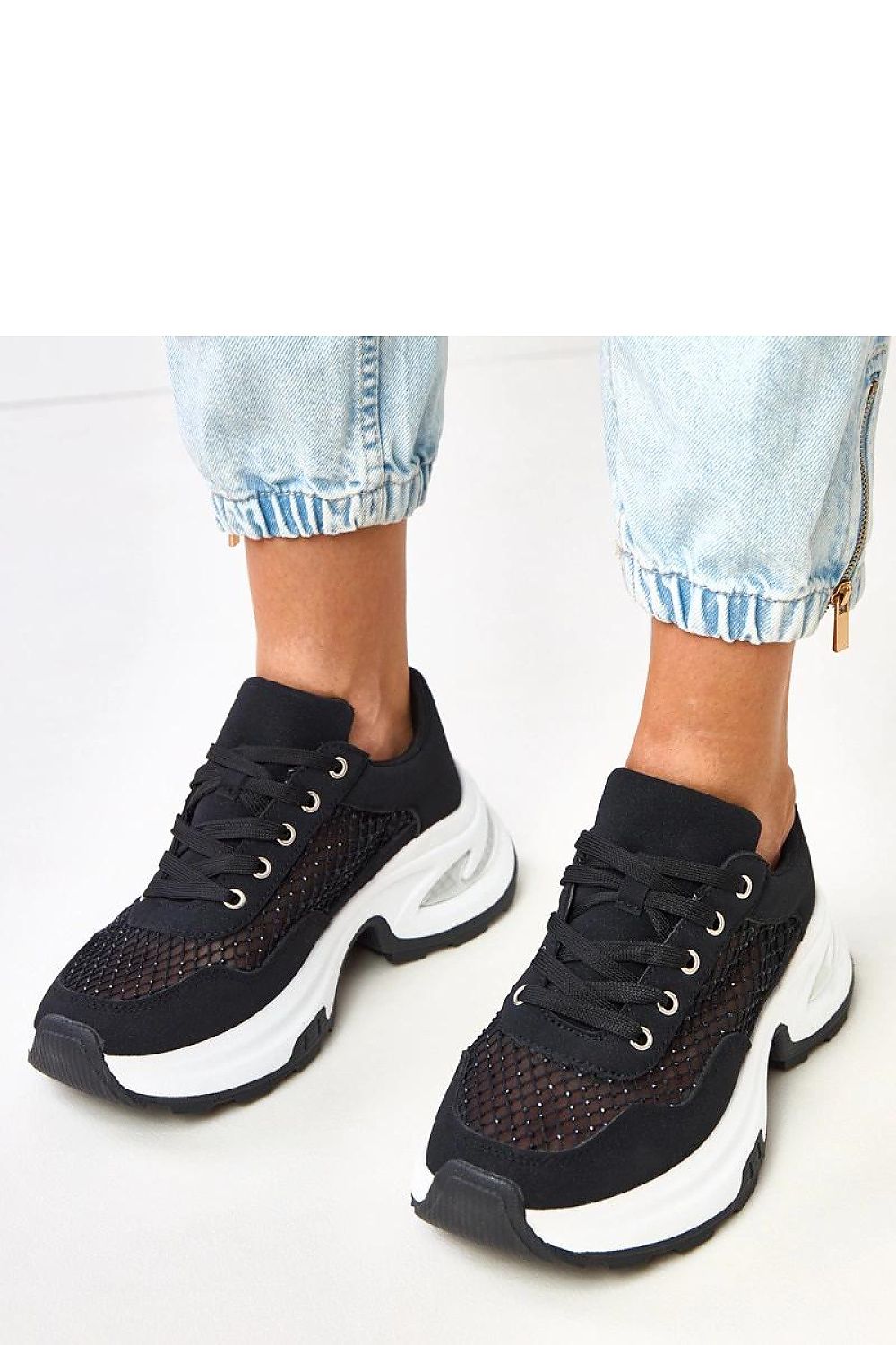 Close-up of Solea low-cut sports shoes featuring intricate zircon embellishments and high-quality synthetic leather, exuding sophistication and style.